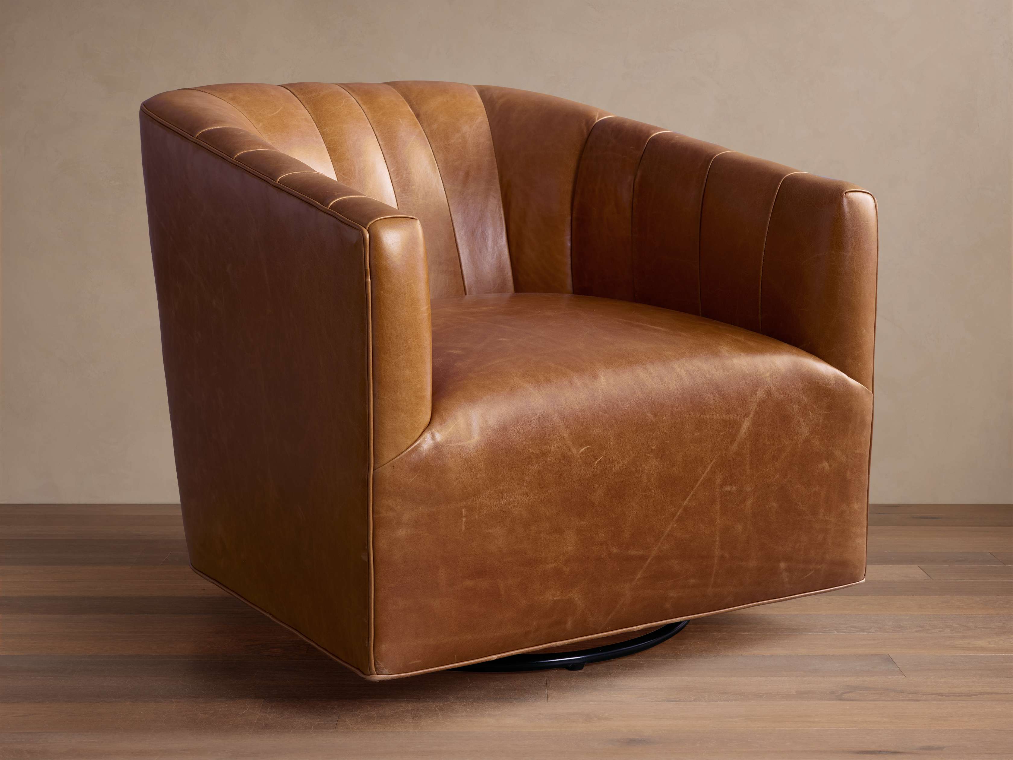 Ellison Leather Channel-Stitched Swivel Glider